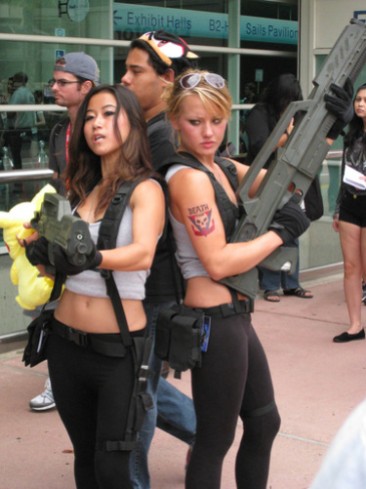 Two Starship Troopers cosplayers posterize "Welcome to the Roughnecks!" Credits: Photo by Mark Turner